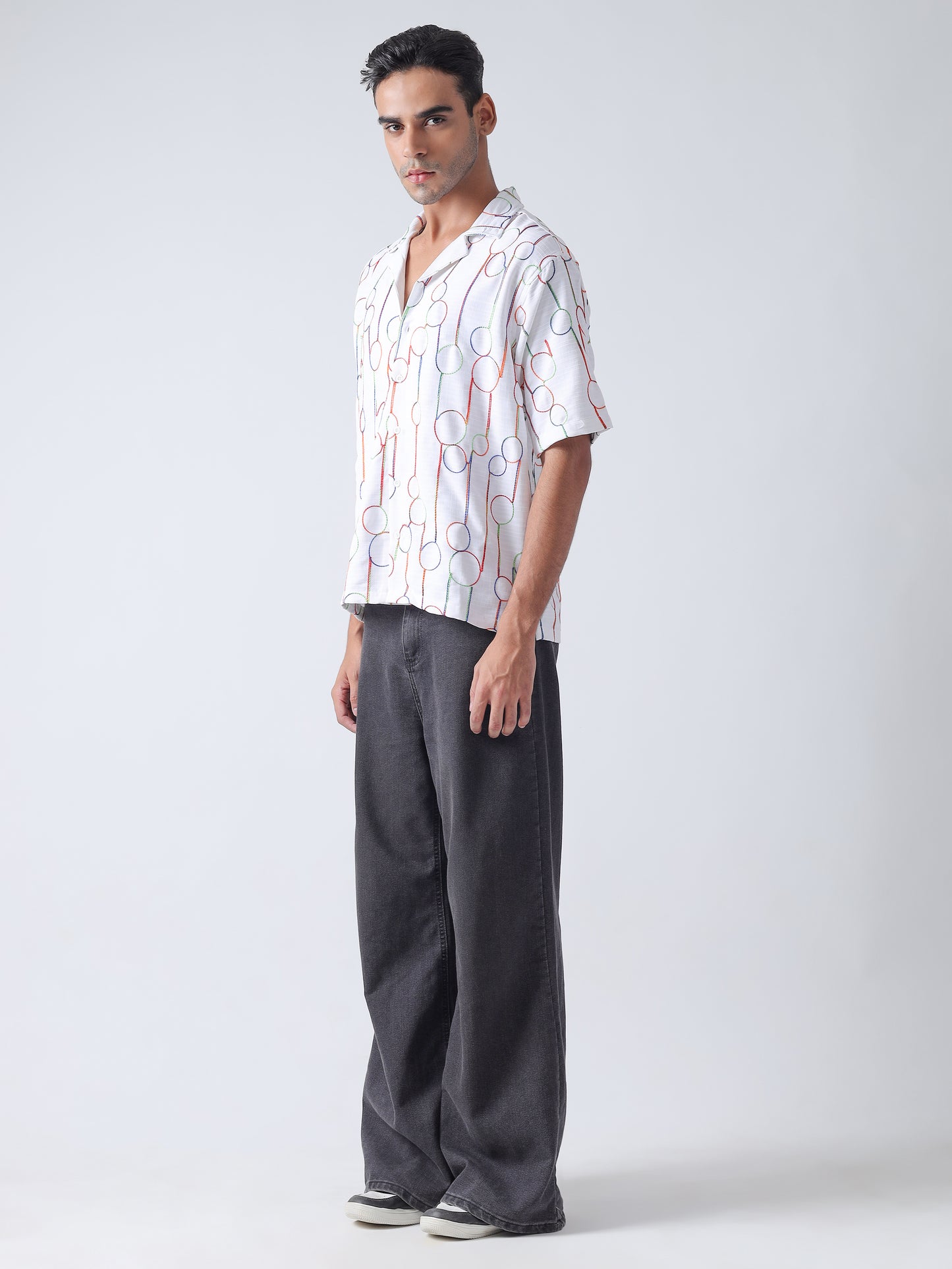 Multi  niddle work Casual shirt ,has a cuban collar, button placket, short regular sleeves, straight hem