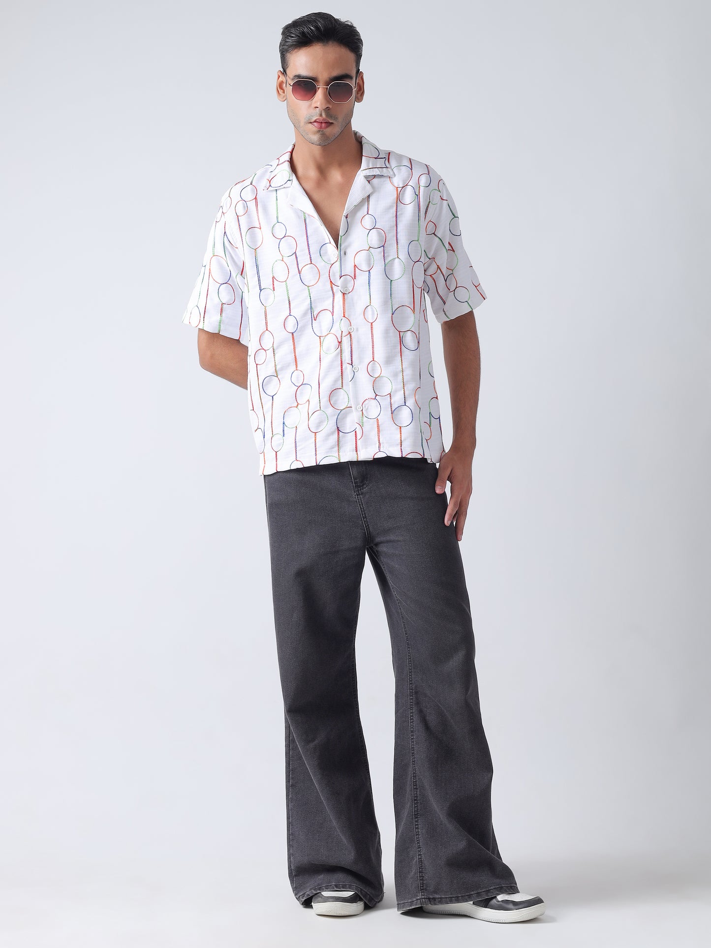 Multi  niddle work Casual shirt ,has a cuban collar, button placket, short regular sleeves, straight hem