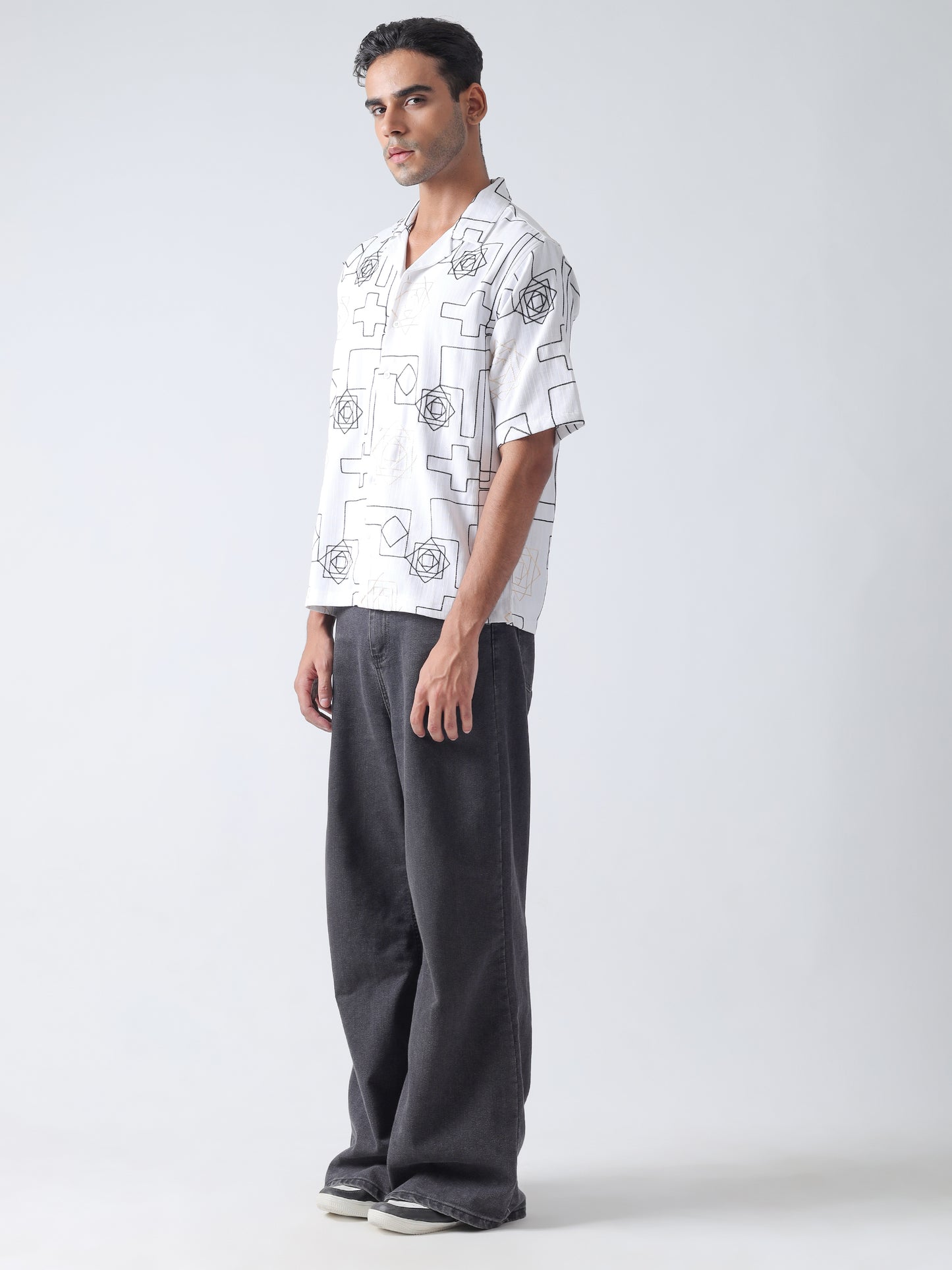 Off white niddle work Casual shirt ,has a cuban collar, button placket, short regular sleeves, straight hem