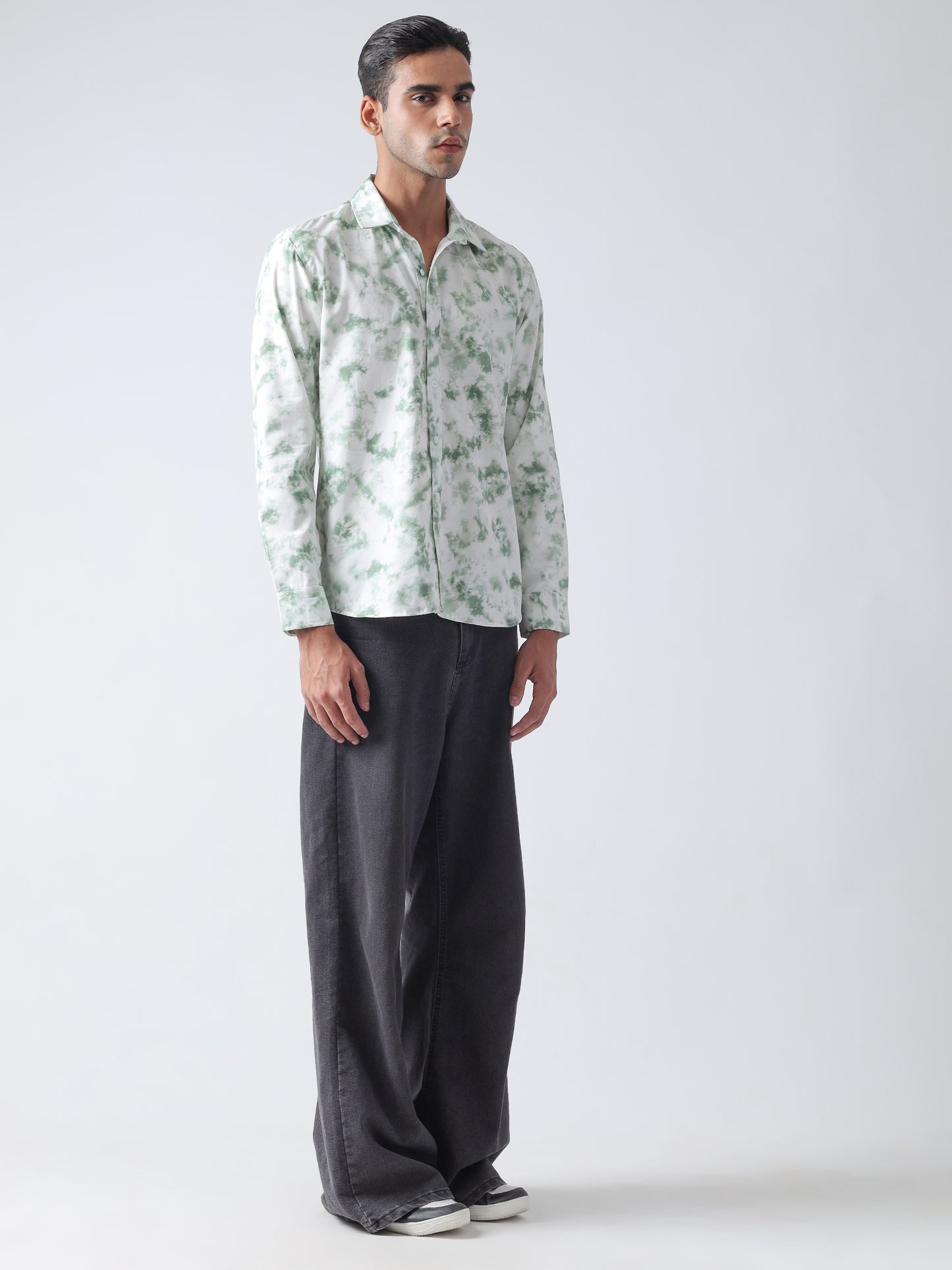 Green printed twill weave casual shirt ,has a spread collar, button placket, long regular sleeves, curved hem