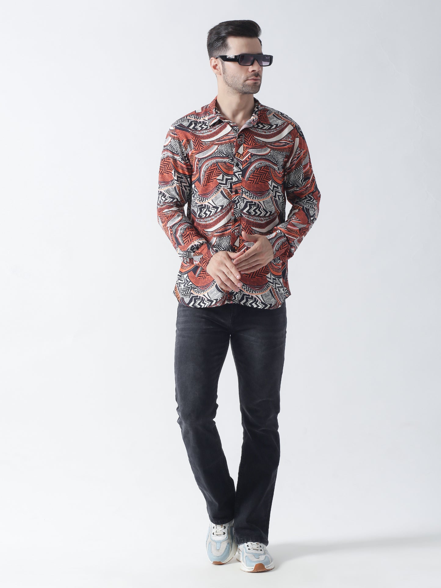 Multi printed plain weave casual shirt ,has a spread collar, button placket, long regular sleeves, curved hem