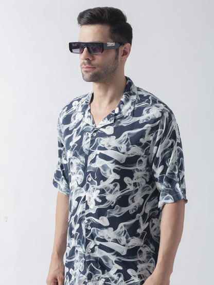 Navy printed plain weave casual shirt ,has a spread collar, button placket, long regular sleeves, curved hem